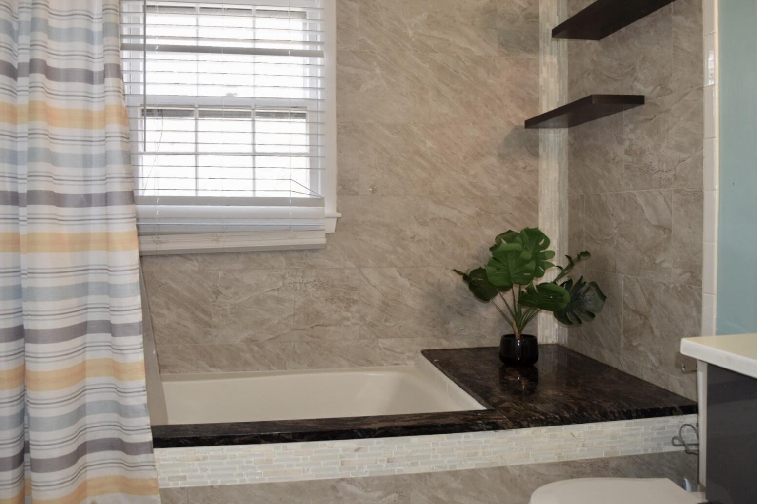 140 Mitchells Way Hyannis, MA 02601 - Photo 23 of 45 a view of a bath tub sitting in a bathroom