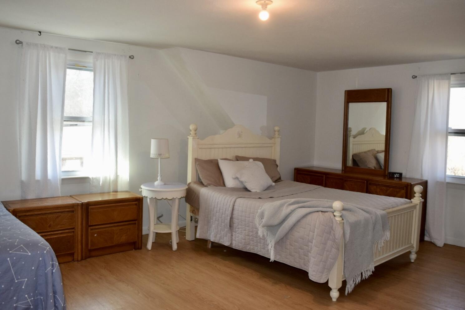 140 Mitchells Way Hyannis, MA 02601 - Photo 31 of 45 a bedroom with a bed and a window