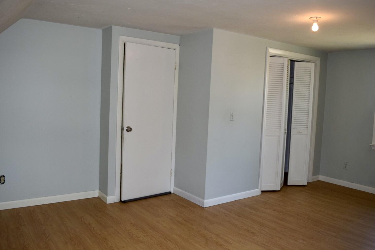 140 Mitchells Way Hyannis, MA 02601 - Photo 35 of 45 a view of an empty room with wooden floor