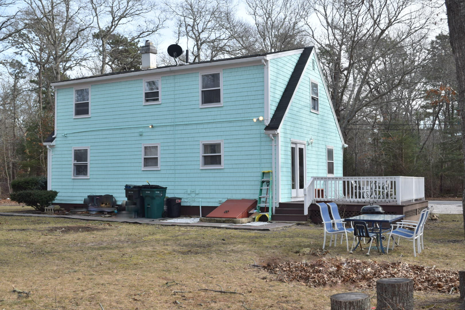 140 Mitchells Way Hyannis, MA 02601 - Photo 40 of 45 a view of a outdoor with a chairs and table in the patio