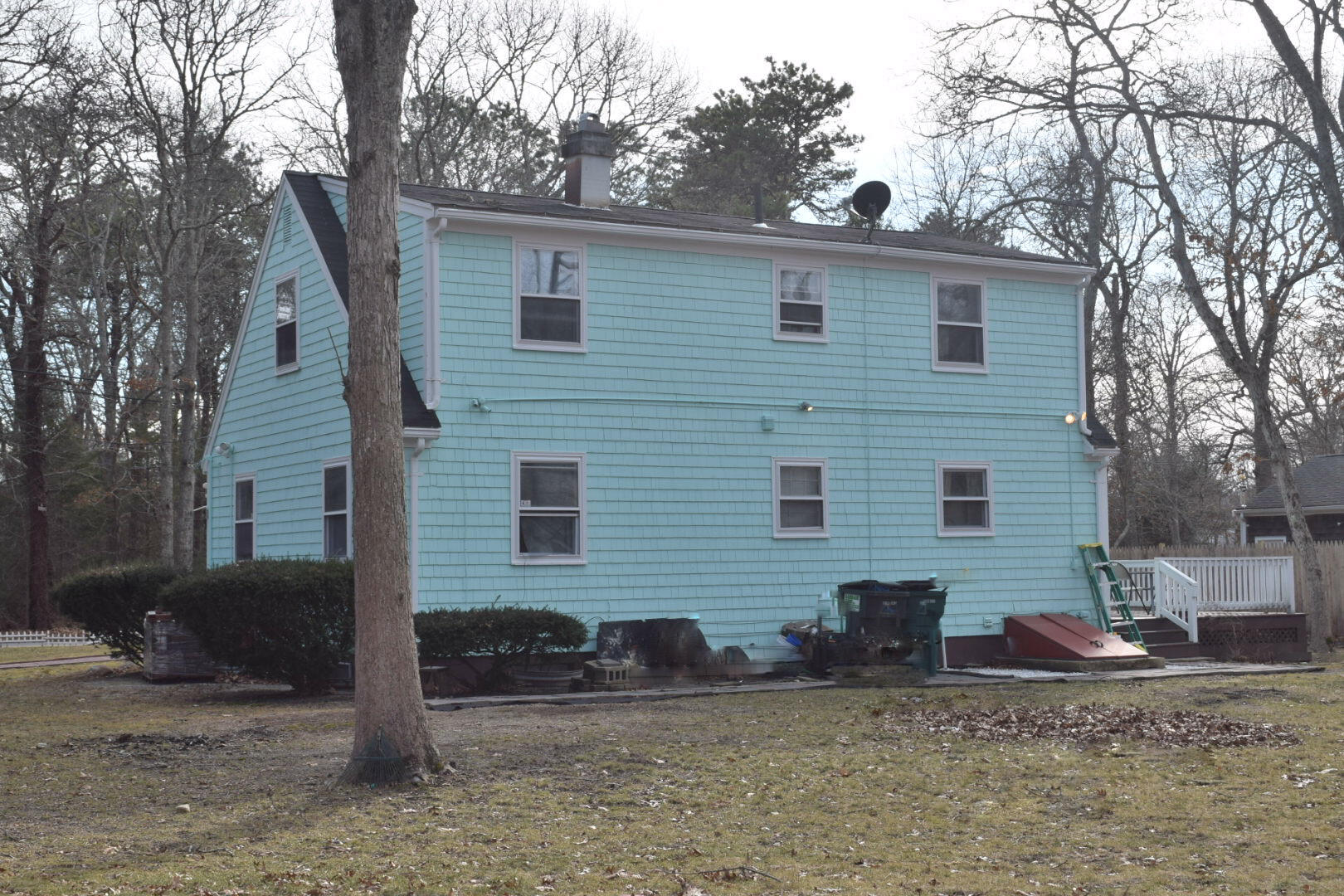 140 Mitchells Way Hyannis, MA 02601 - Photo 41 of 45 a view of a house with a yard and large tree