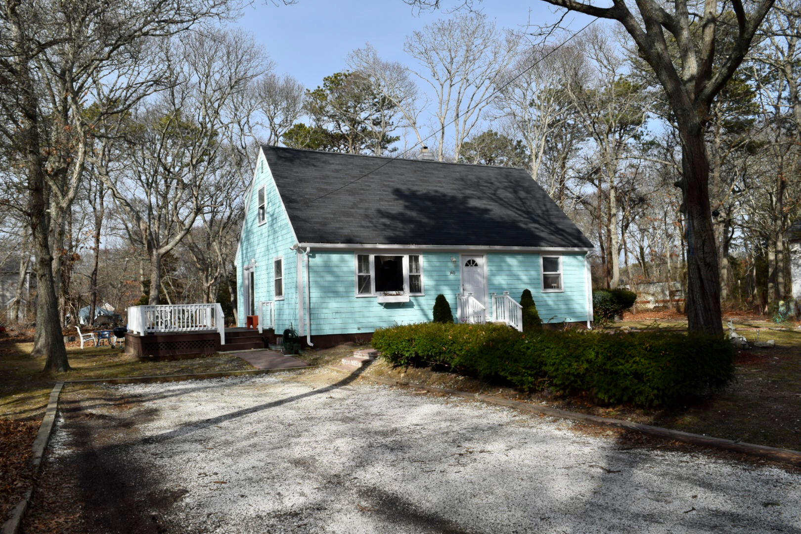 140 Mitchells Way Hyannis, MA 02601 - Photo 43 of 45 a front view of a house with a garden