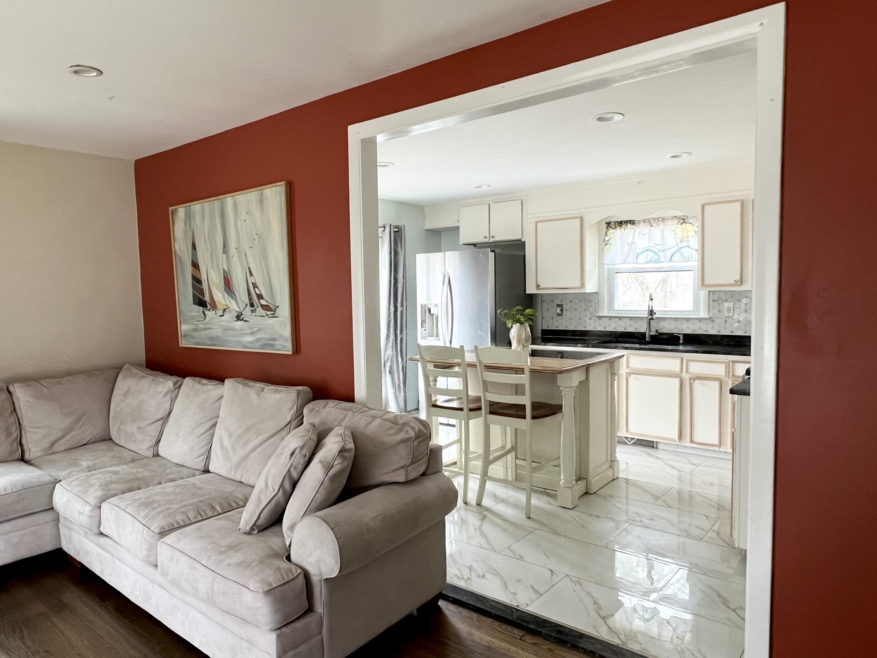 140 Mitchells Way Hyannis, MA 02601 - Photo 5 of 45 a living room with furniture and kitchen view