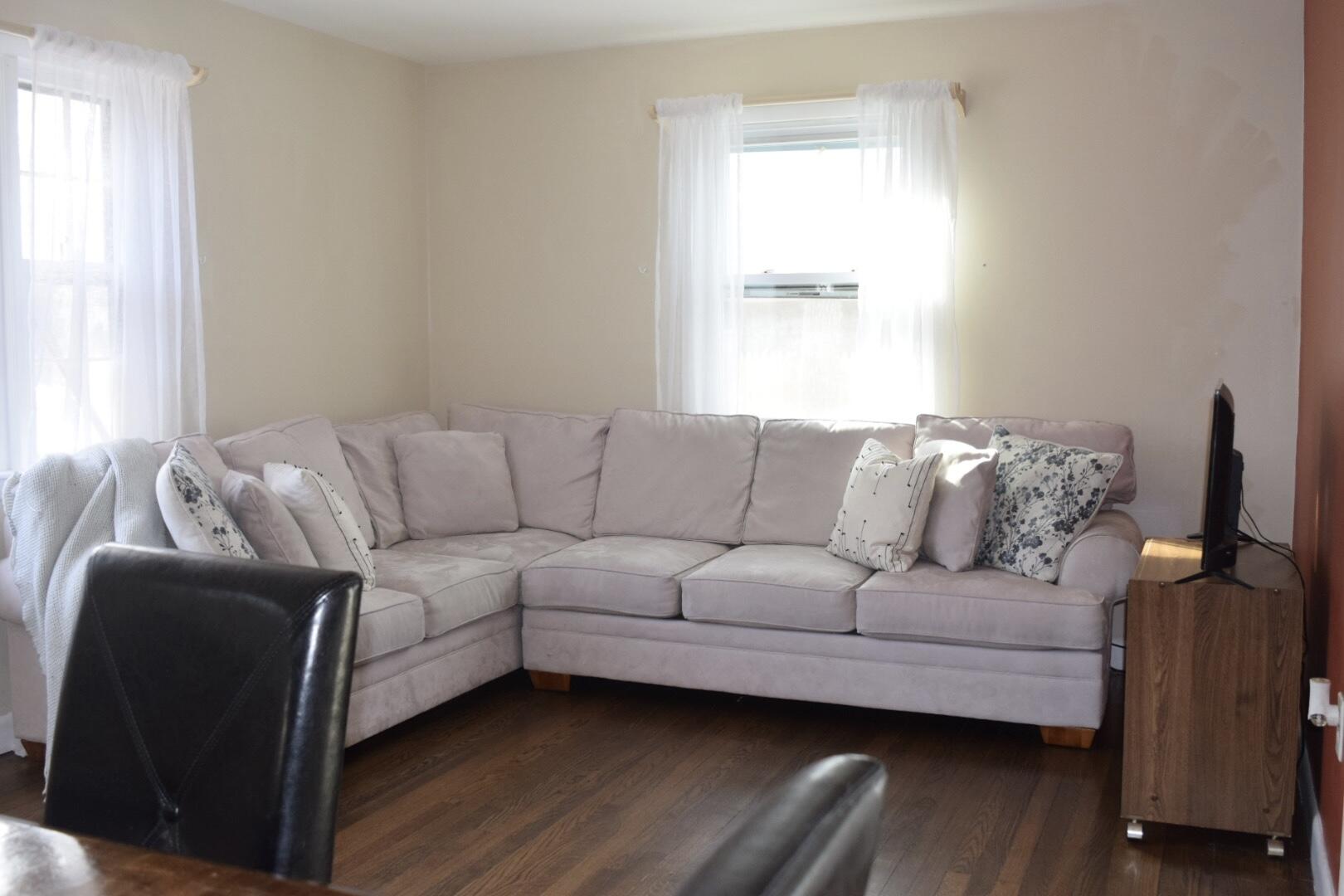 140 Mitchells Way Hyannis, MA 02601 - Photo 7 of 45 a living room with furniture and a window