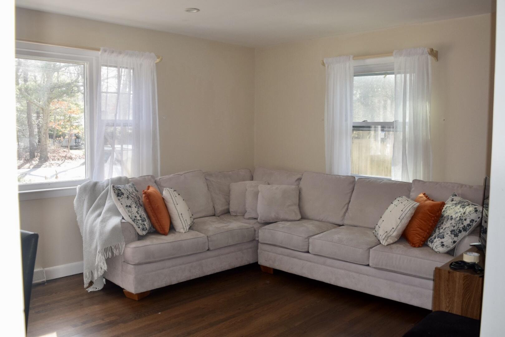 140 Mitchells Way Hyannis, MA 02601 - Photo 8 of 45 a living room with furniture and a window