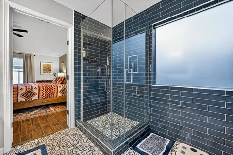 a bathroom with a sink and a shower