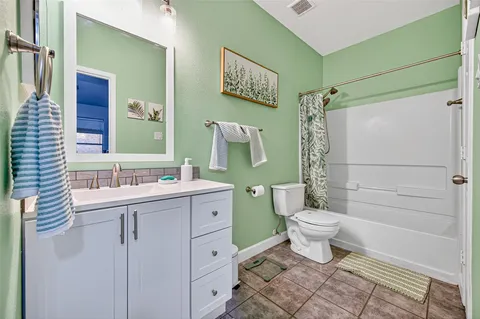 a room with furniture and a flat screen tv