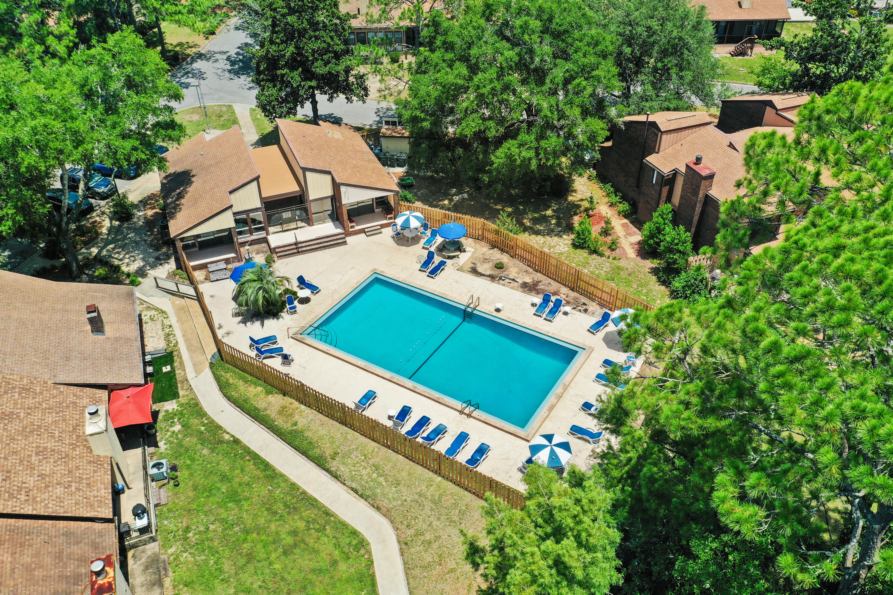 25 Hidden Cove Circle Valparaiso, FL 32580 - Photo 2 of 13 an aerial view of a house with a yard and trees