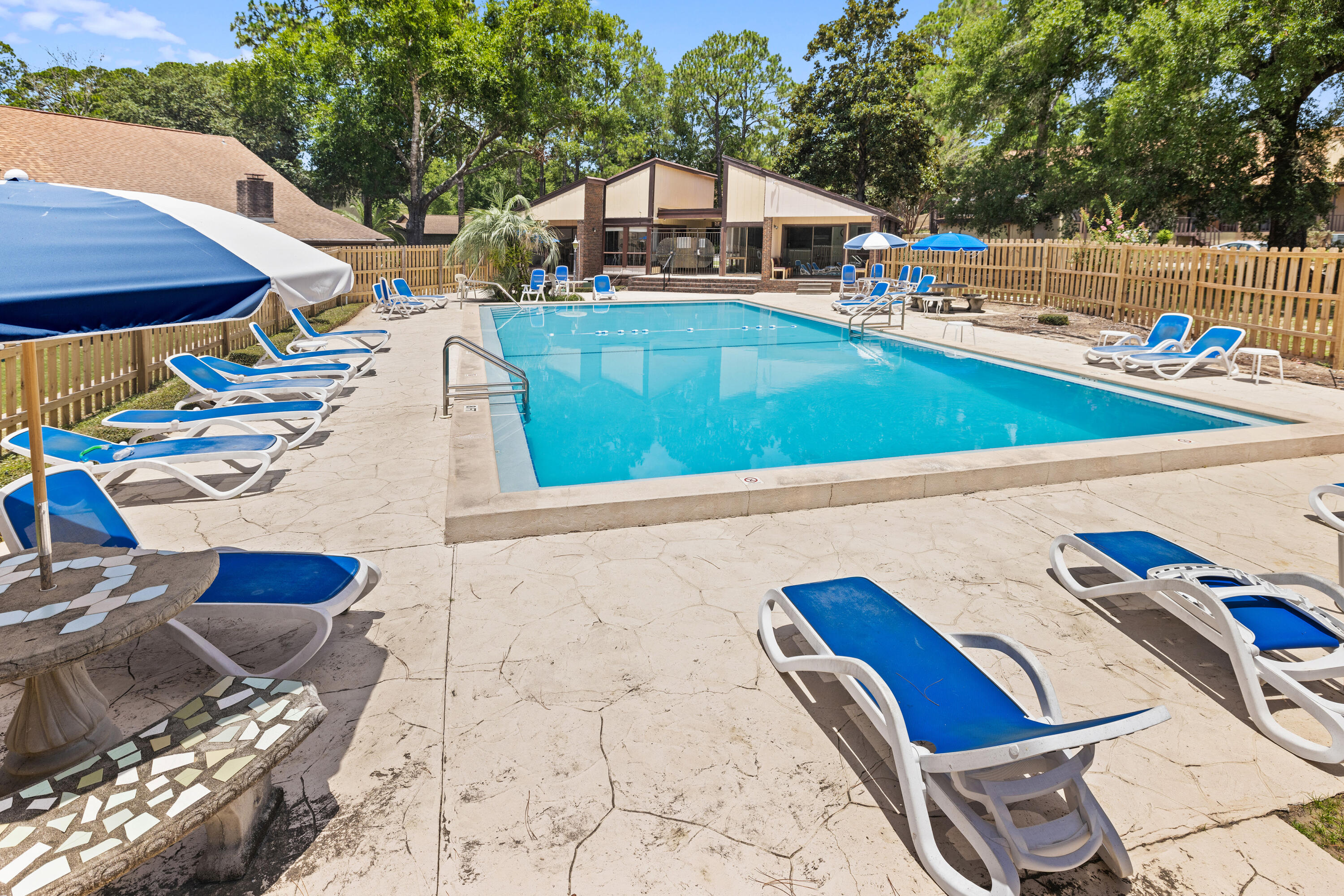 25 Hidden Cove Circle Valparaiso, FL 32580 - Photo 10 of 13 a view of swimming pool with chairs
