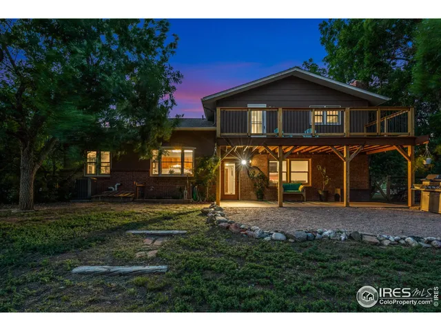 a view of city and green space