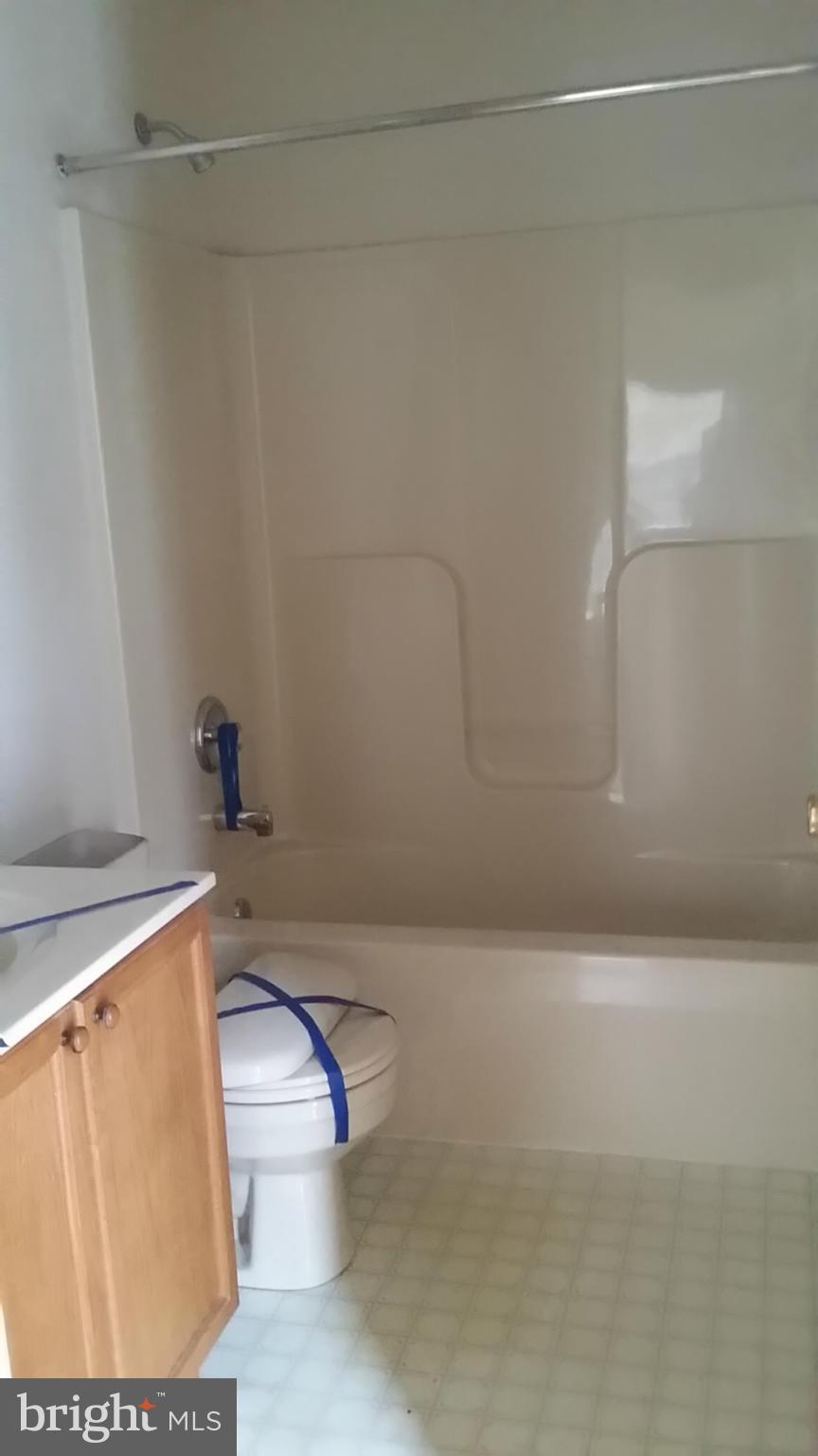 2706 Rona Road Baltimore, MD 21207 - Photo 4 of 10 a bathroom with a toilet and a shower