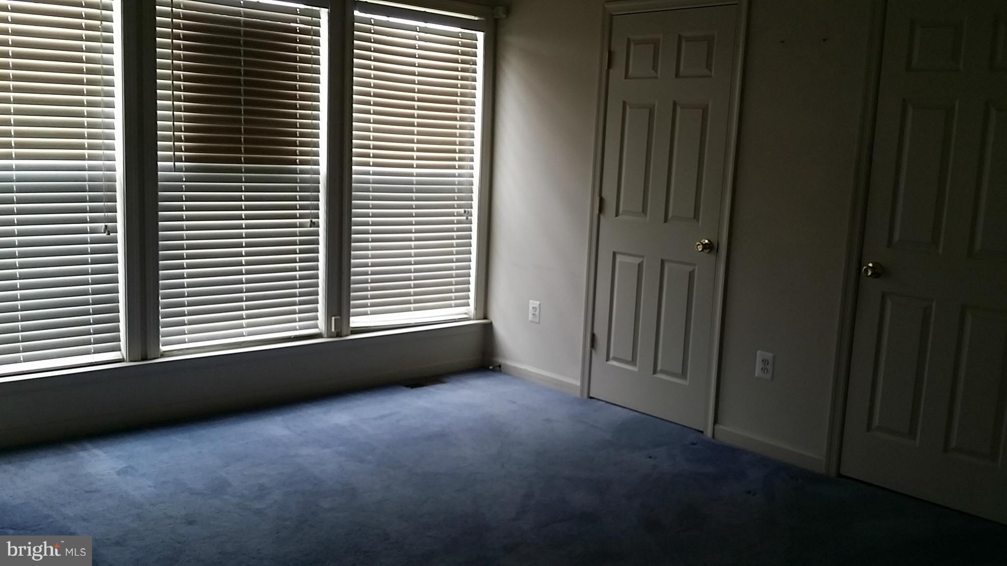 2706 Rona Road Baltimore, MD 21207 - Photo 6 of 10 a view of a room that has a window in it