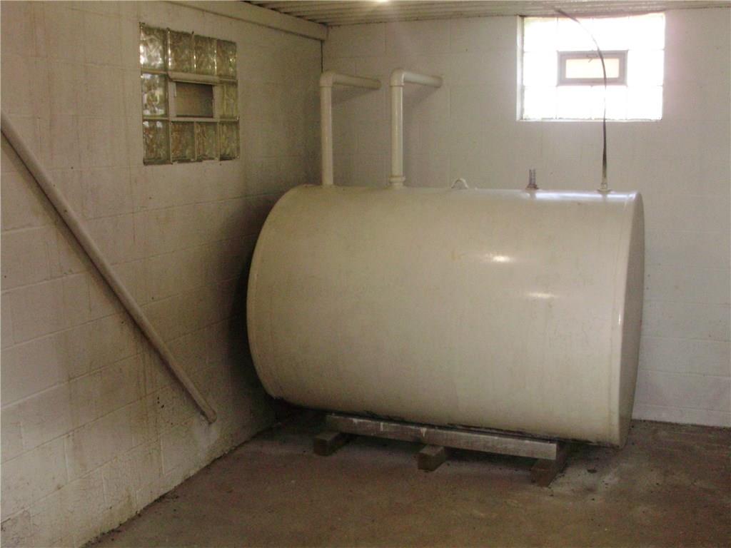 515 Station Road Scenery Hill, PA 15360 - Photo 19 of 23 Oil furnace storage tanks inside under 9x22 front porch