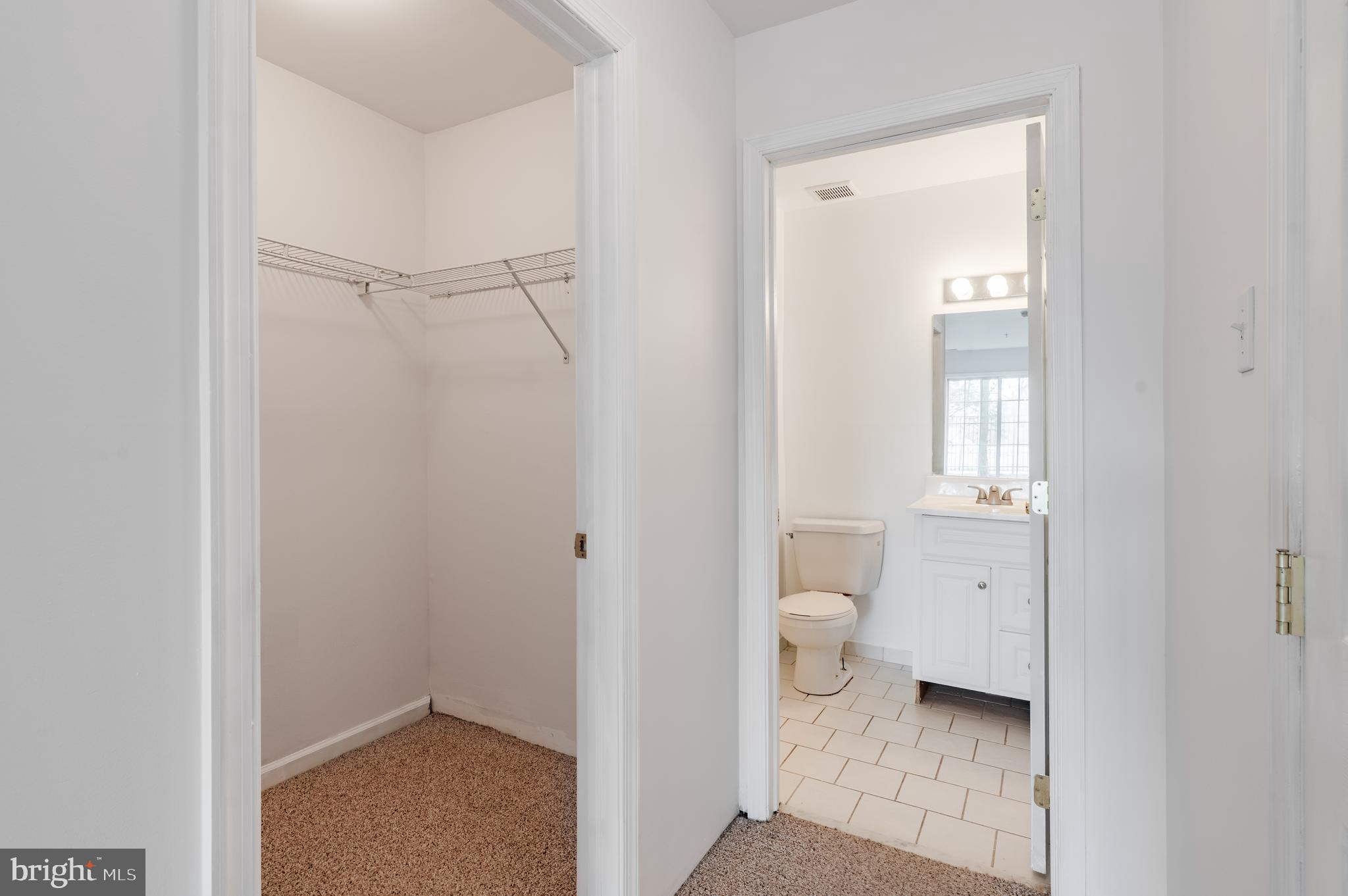 9228 Blue Grass Road, Unit 39 Philadelphia, PA 19114 - Photo 13 of 21 a bathroom view of a toilet and a sink