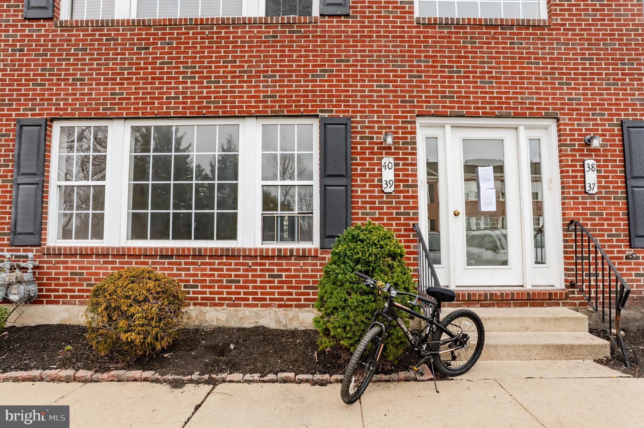 9228 Blue Grass Road, Unit 39 Philadelphia, PA 19114 - Photo 17 of 21 a front view of a building