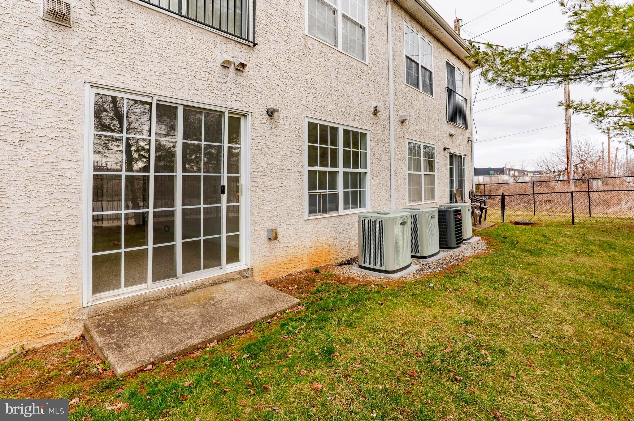 9228 Blue Grass Road, Unit 39 Philadelphia, PA 19114 - Photo 19 of 21 a house view with a outdoor space