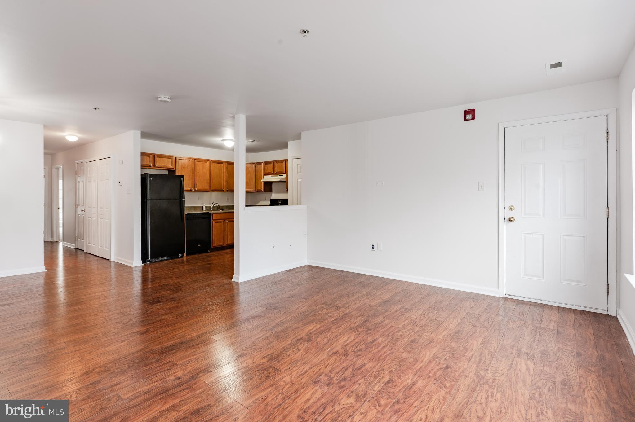 9228 Blue Grass Road, Unit 39 Philadelphia, PA 19114 - Photo 3 of 21 a view of a kitchen with a sink and a refrigerator