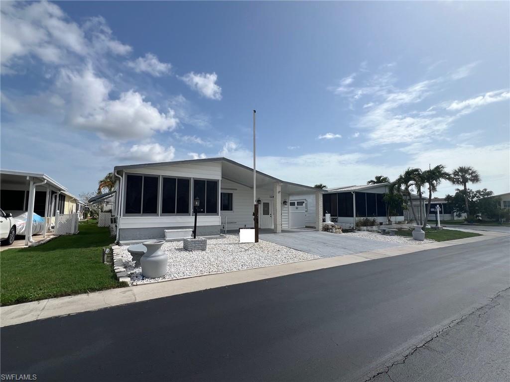 128 Mediterranean Way, Unit 128 Naples, FL 34104 - Photo 1 of 41 Gallery Image 1