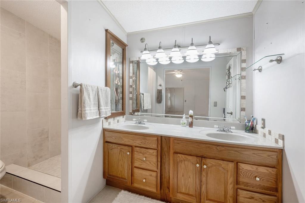 128 Mediterranean Way, Unit 128 Naples, FL 34104 - Photo 17 of 41 Upgraded master bath dual sinks
