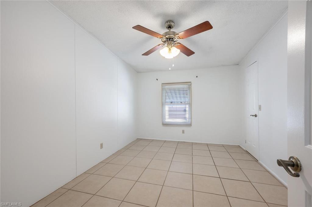 128 Mediterranean Way, Unit 128 Naples, FL 34104 - Photo 19 of 41 Second Bedroom