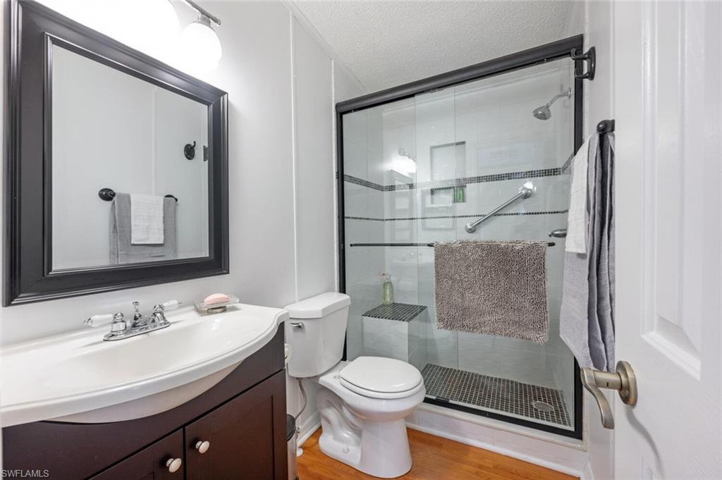 128 Mediterranean Way, Unit 128 Naples, FL 34104 - Photo 20 of 41 Remodeled second bathroom