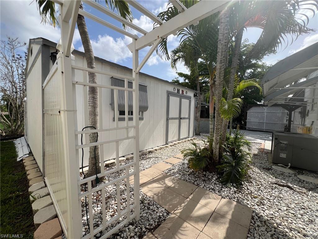 128 Mediterranean Way, Unit 128 Naples, FL 34104 - Photo 26 of 41 View of shed