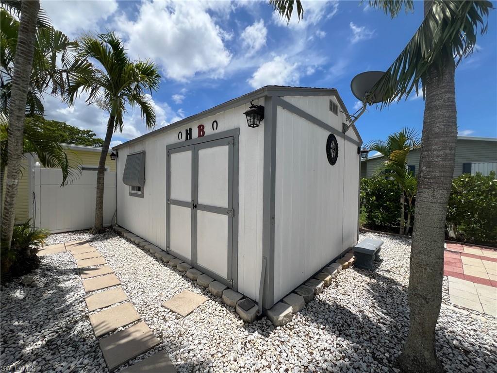128 Mediterranean Way, Unit 128 Naples, FL 34104 - Photo 28 of 41 View of shed.