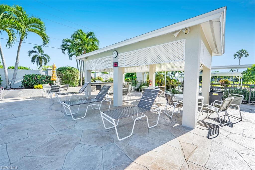 128 Mediterranean Way, Unit 128 Naples, FL 34104 - Photo 34 of 41 Community pool