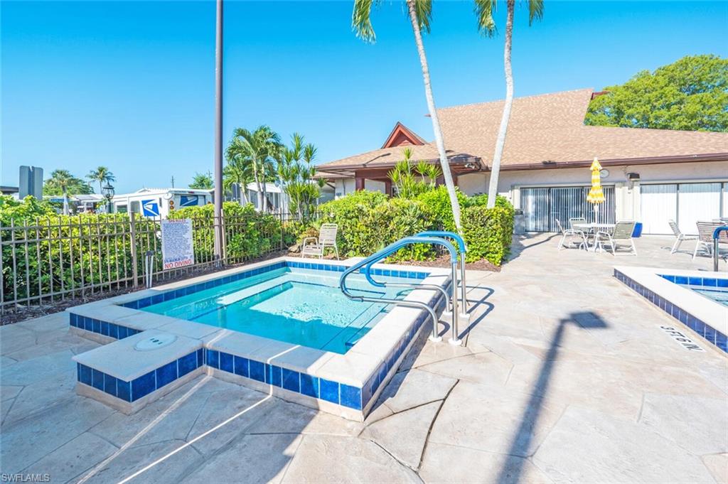 128 Mediterranean Way, Unit 128 Naples, FL 34104 - Photo 35 of 41 Community pool
