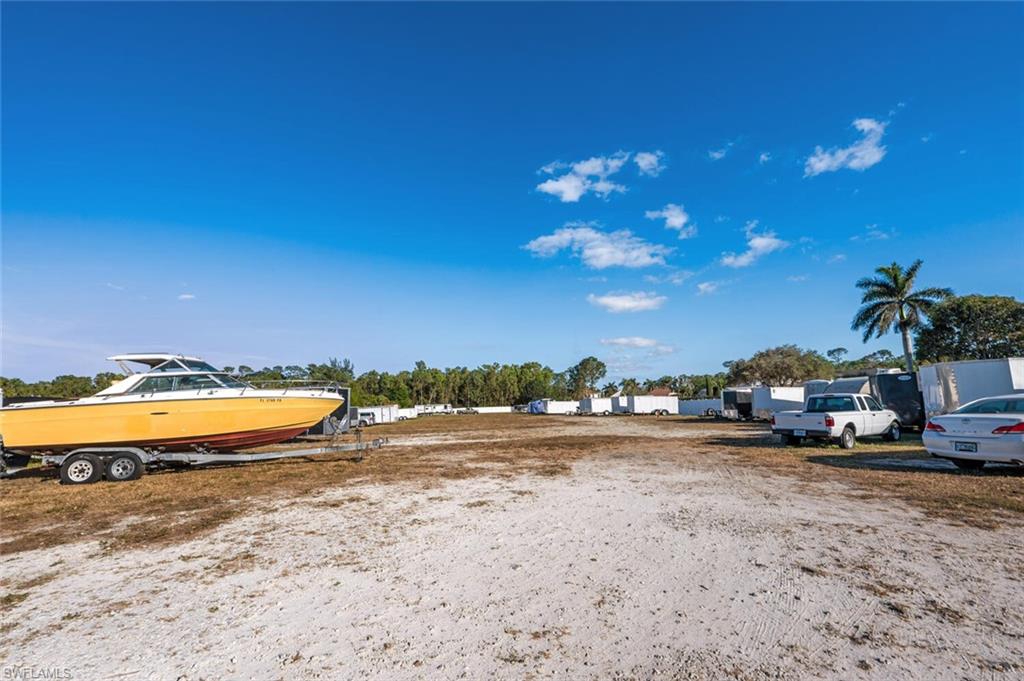 128 Mediterranean Way, Unit 128 Naples, FL 34104 - Photo 39 of 41 Vehicle Storage area in back of complex available to Owners