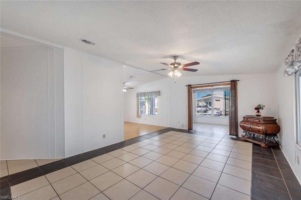 128 Mediterranean Way, Unit 128 Naples, FL 34104 - Photo 10 of 41 Living area
