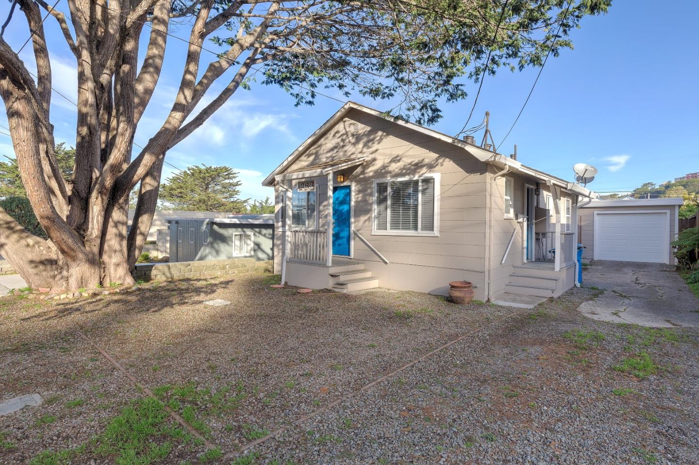 263 Clarendon Road Pacifica, CA 94044 - Photo 2 of 36 a view of a house with a yard and large tree