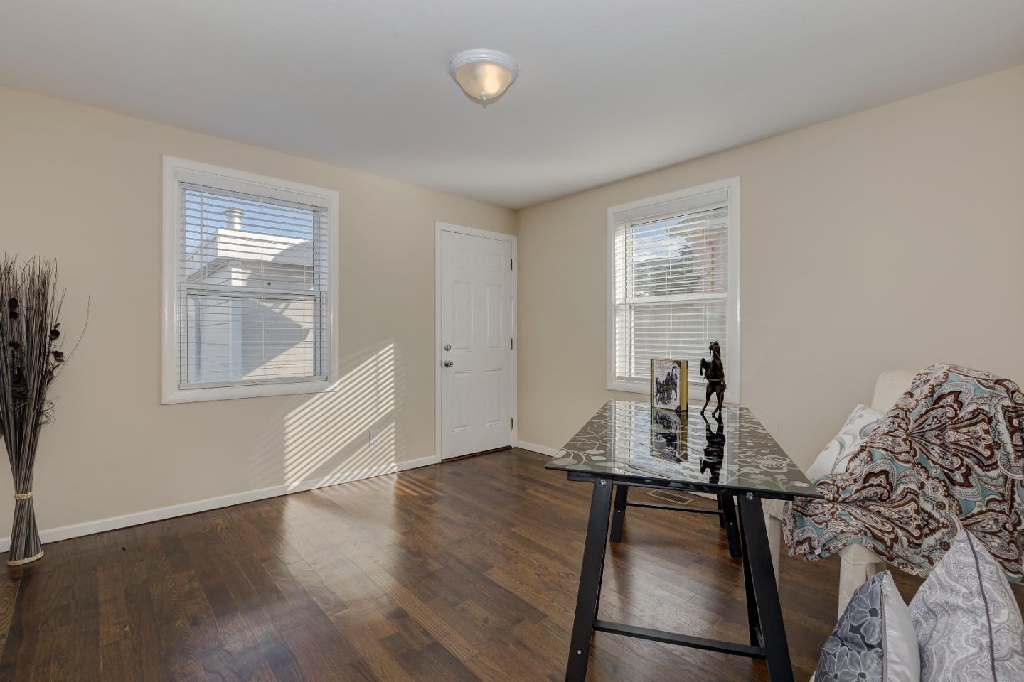 263 Clarendon Road Pacifica, CA 94044 - Photo 25 of 36 a view of a room with furniture and wooden floor