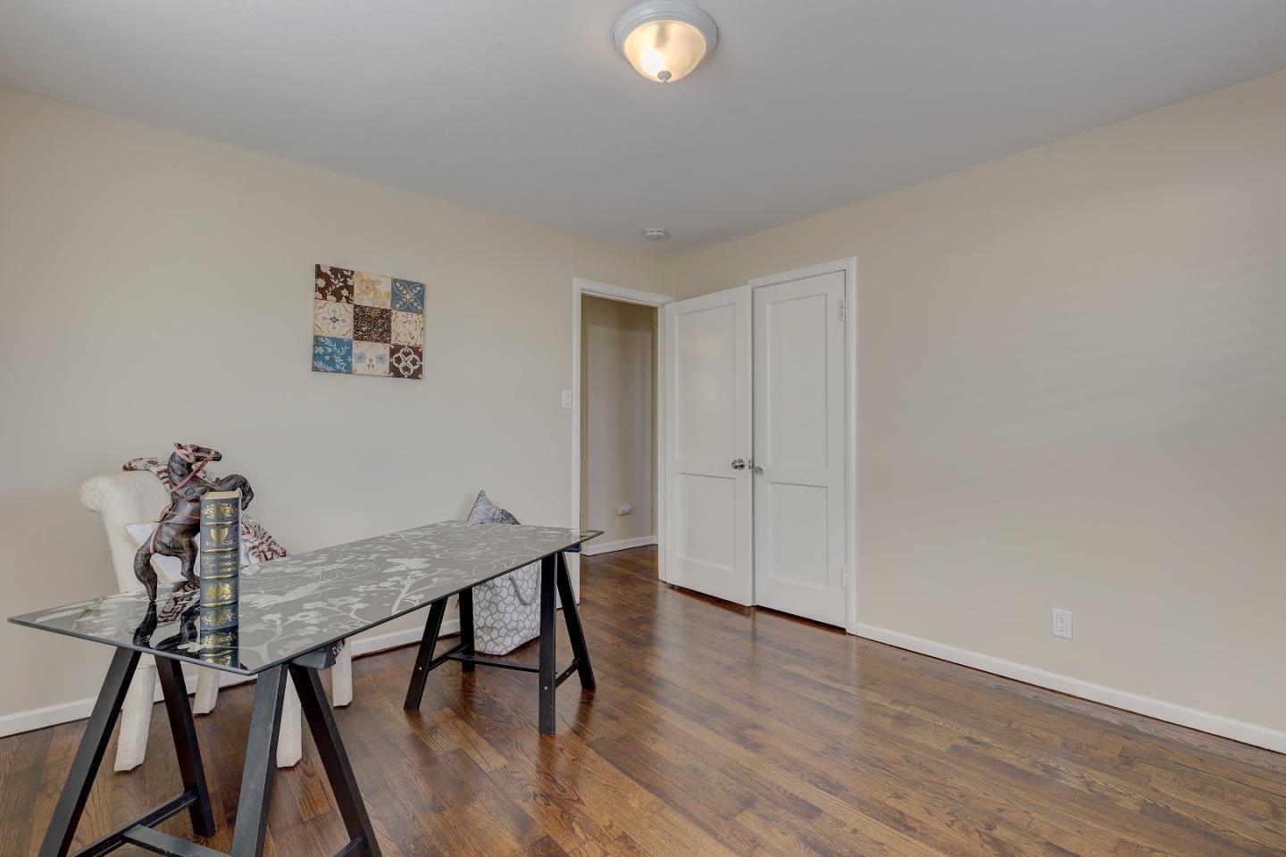 263 Clarendon Road Pacifica, CA 94044 - Photo 27 of 36 a view of a room with furniture and wooden floor