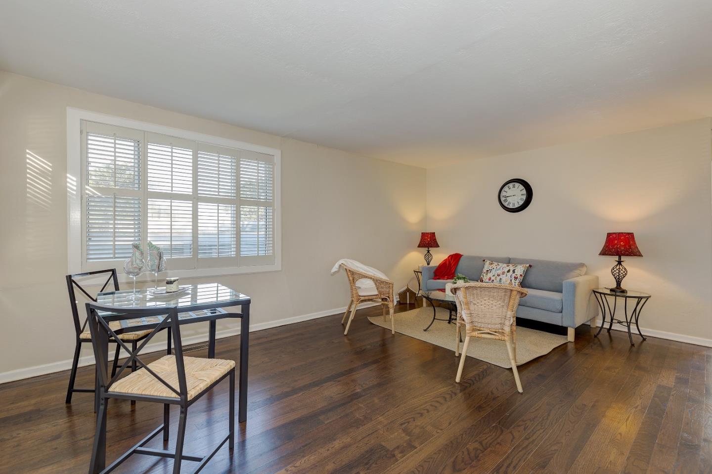 263 Clarendon Road Pacifica, CA 94044 - Photo 10 of 36 a living room with furniture and a wooden floor
