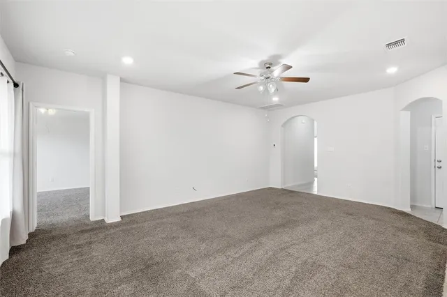 a kitchen with stainless steel appliances a refrigerator sink and microwave