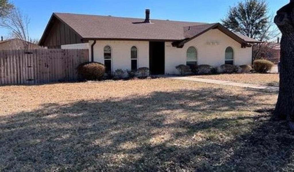4422 Galaxie Road Garland, TX 75044 - Photo 2 of 11 Single-story residence featuring a white stucco exterior and a brown shingle roof