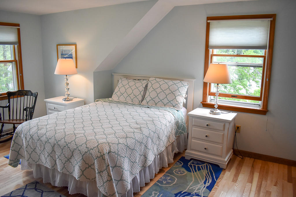 61 Bain Road Dennis Port, MA 02639 - Photo 12 of 22 a bedroom with a bed and a window