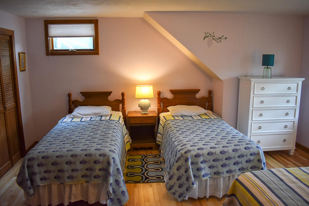 61 Bain Road Dennis Port, MA 02639 - Photo 14 of 22 a bedroom with bed and a window