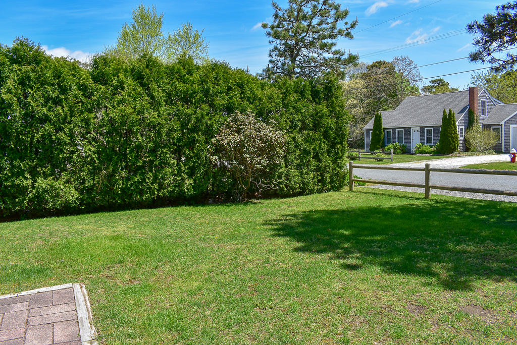 61 Bain Road Dennis Port, MA 02639 - Photo 22 of 22 a view of a garden