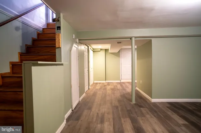 a view of entryway with wooden floor