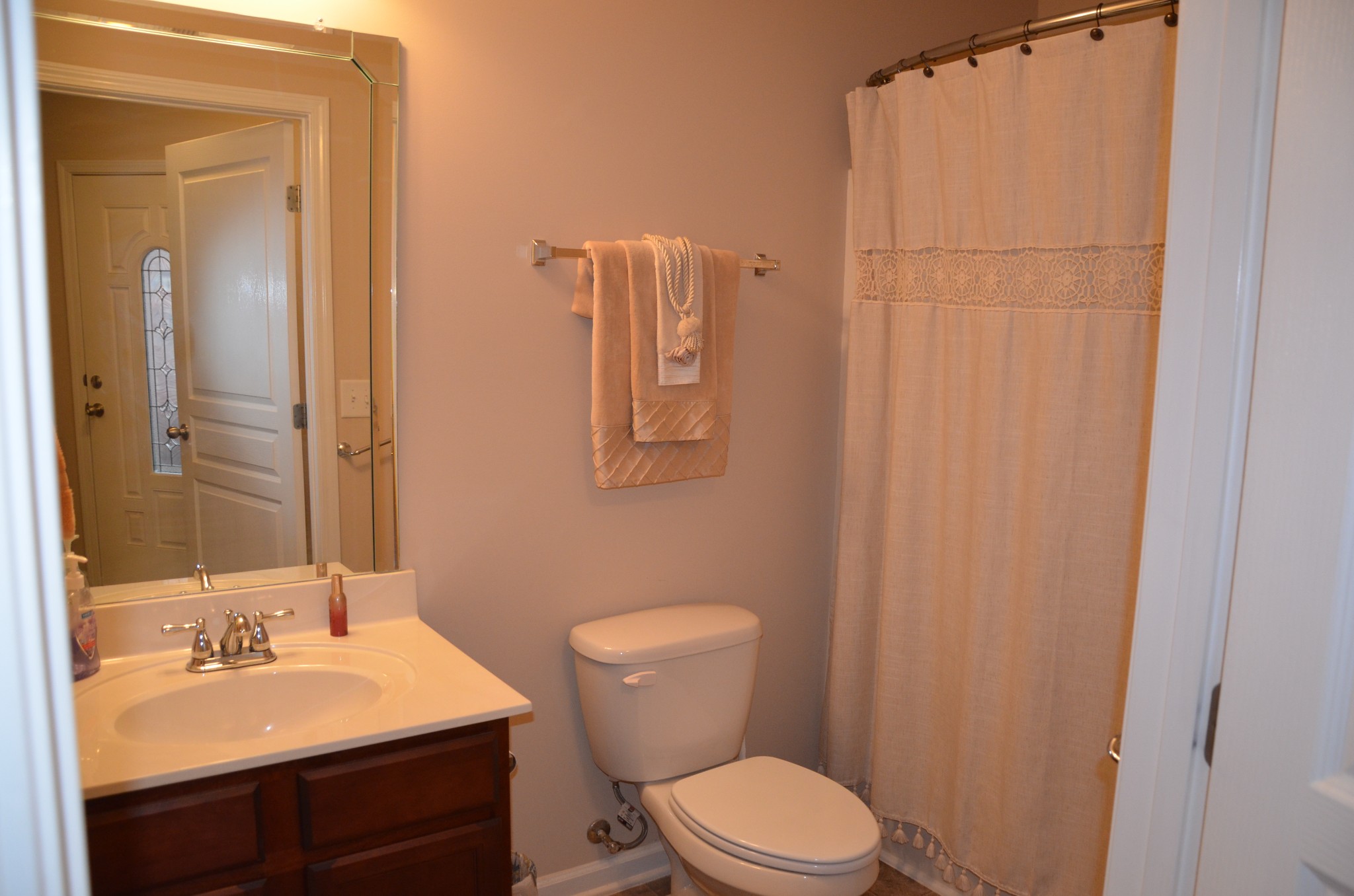 167 Speedwell Lane Lebanon, TN 37087 - Photo 15 of 21 a bathroom with a toilet a sink and mirror