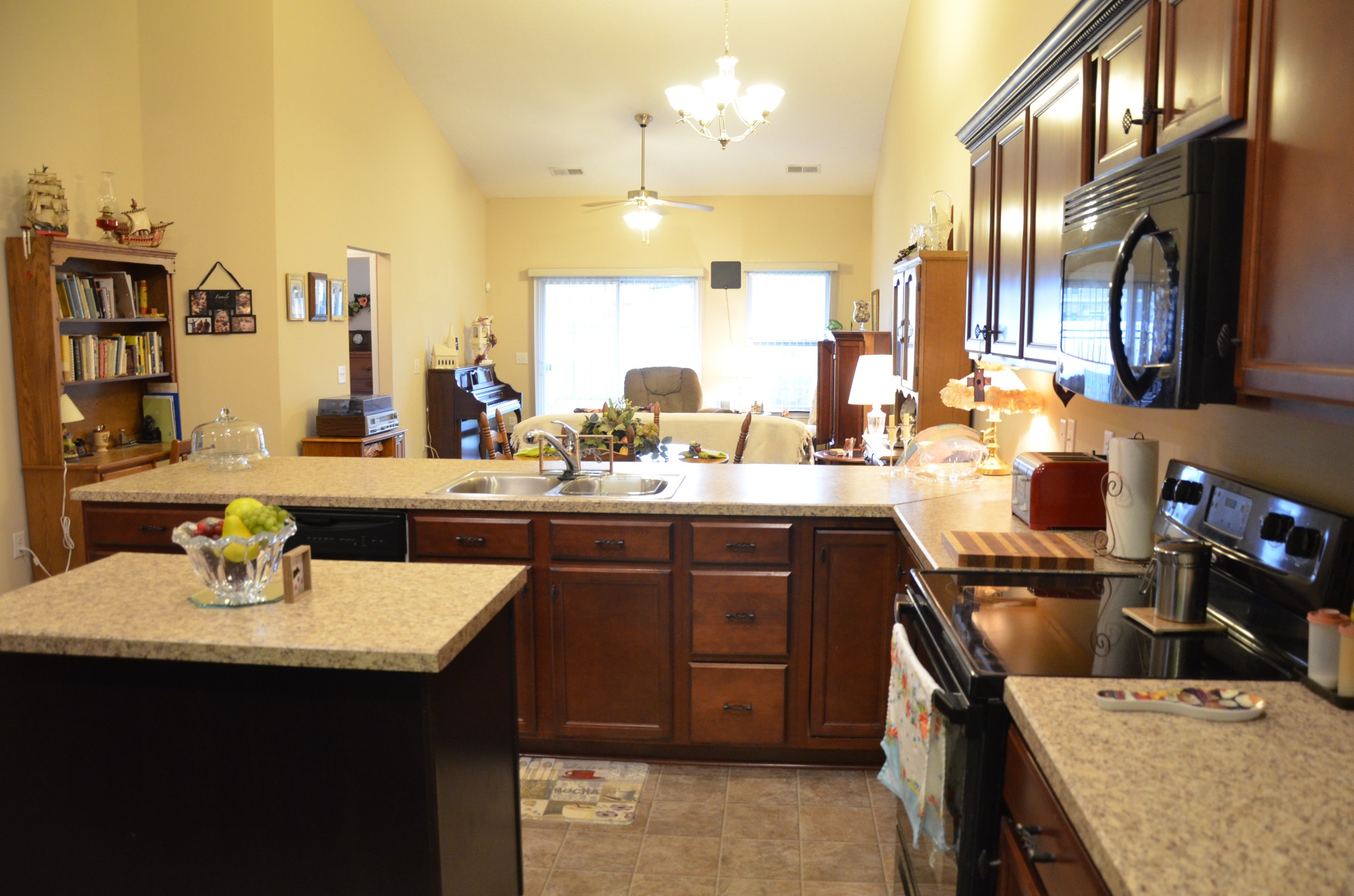 167 Speedwell Lane Lebanon, TN 37087 - Photo 5 of 21 a kitchen with a sink a stove and chairs