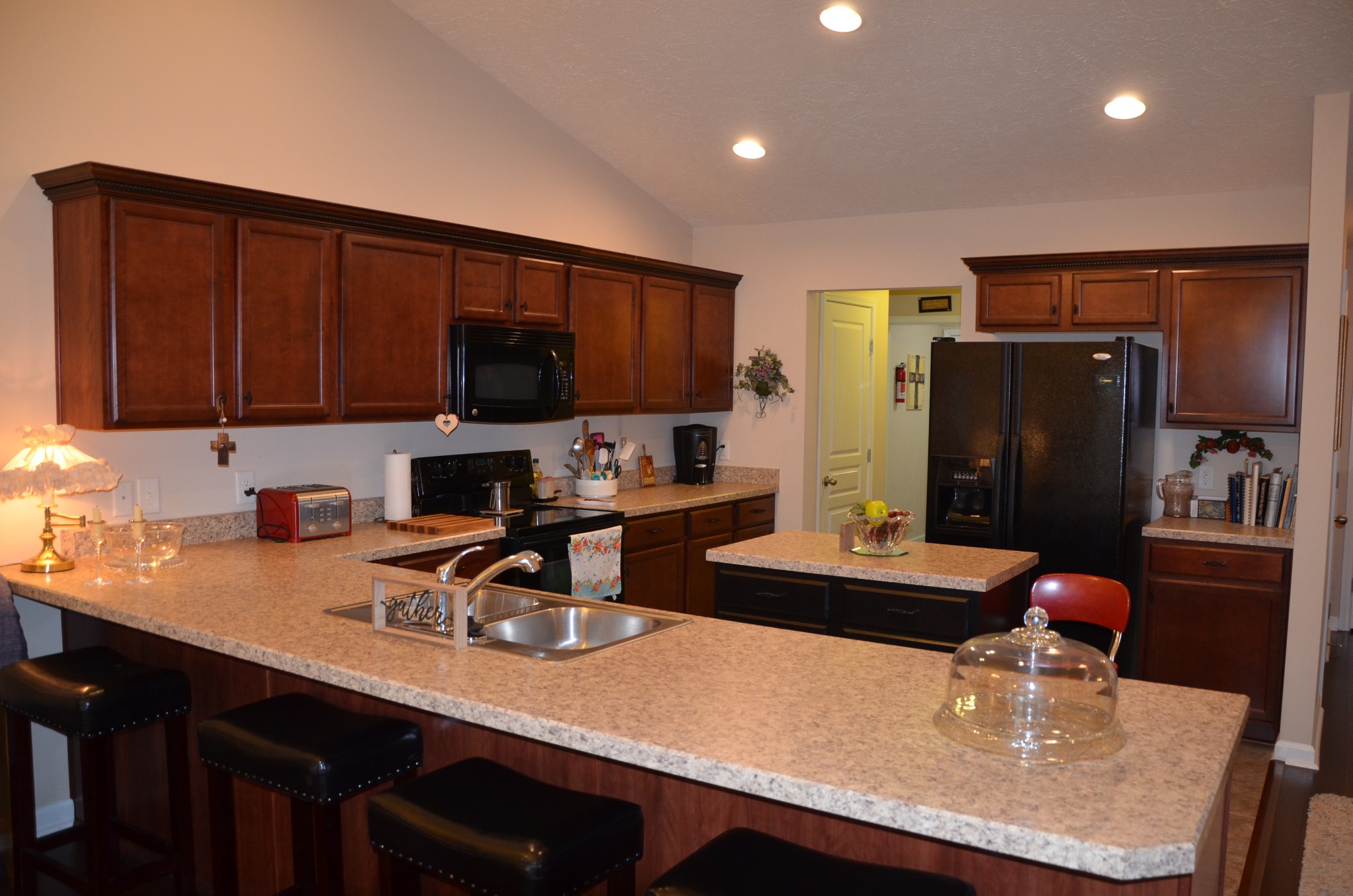 167 Speedwell Lane Lebanon, TN 37087 - Photo 6 of 21 a kitchen with stainless steel appliances granite countertop a sink refrigerator and microwave