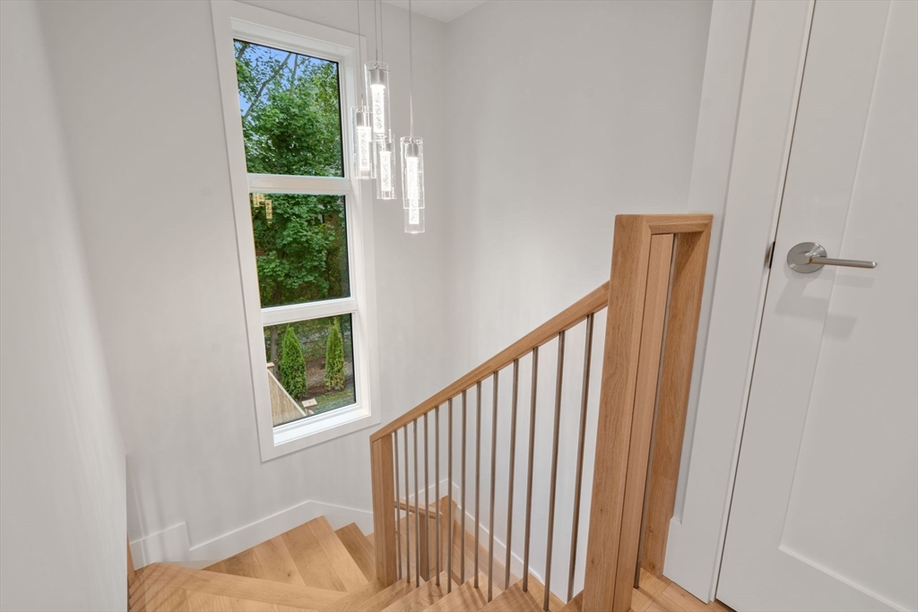 2202 Commonwealth Avenue, Unit 1 Newton, MA 02466 - Photo 17 of 34 a view of a balcony and an entryway