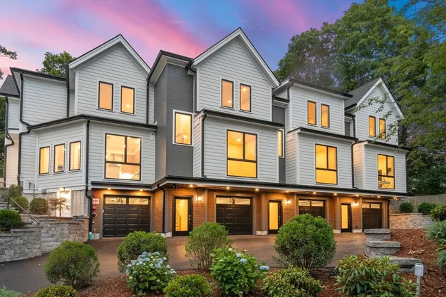 front view of a house with a small yard