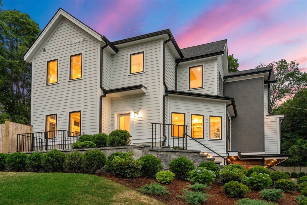 2202 Commonwealth Avenue, Unit 1 Newton, MA 02466 - Photo 31 of 34 a front view of a house with garden