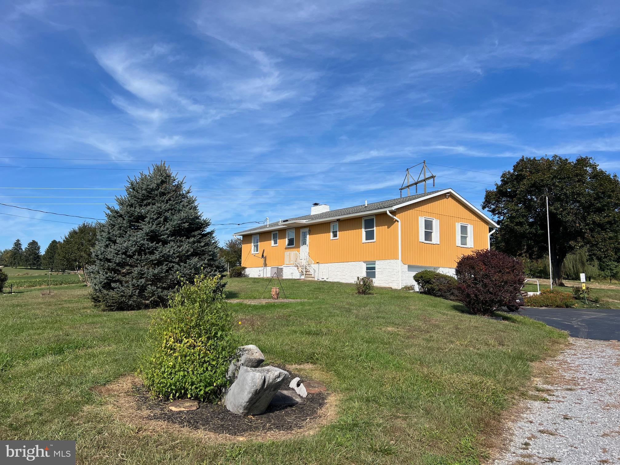15009 Falling Waters Road Williamsport, MD 21795 - Photo 14 of 16 a front view of a house with garden
