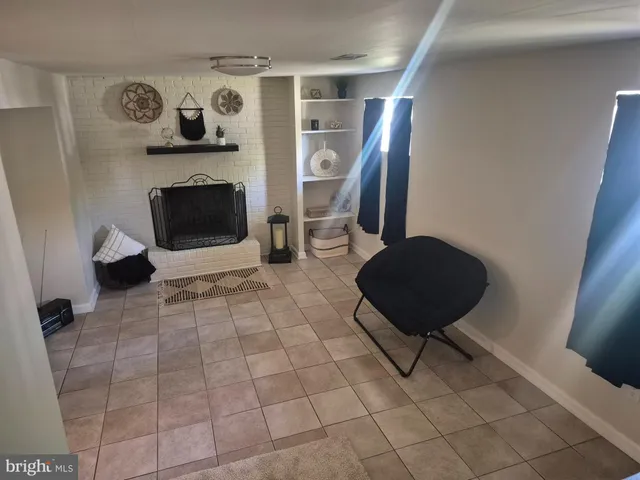 a kitchen with a sink and a stove top oven
