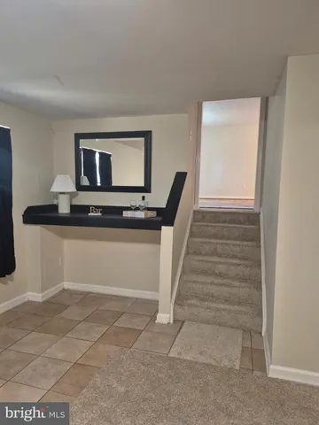 a bathroom with a sink and a shower